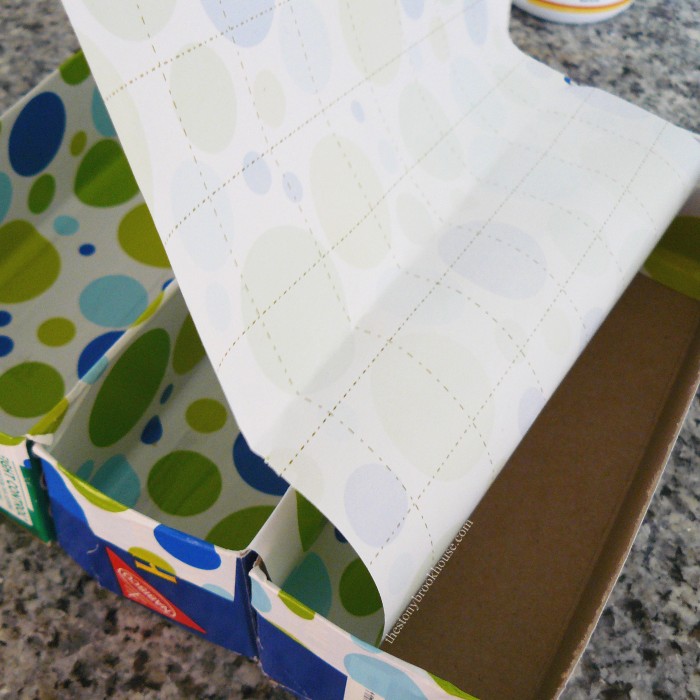 covering boxes with wrapping paper