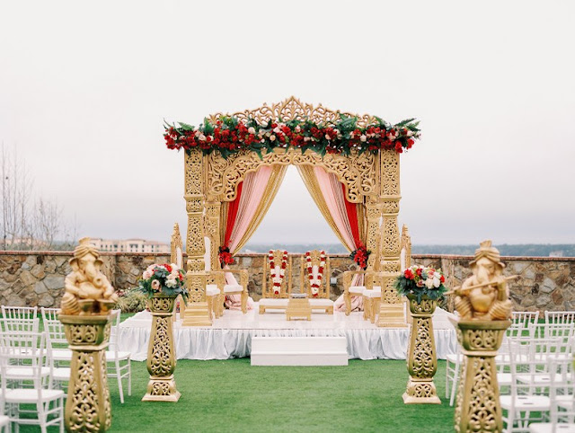 Hindi wedding ceremony setup with white and gold