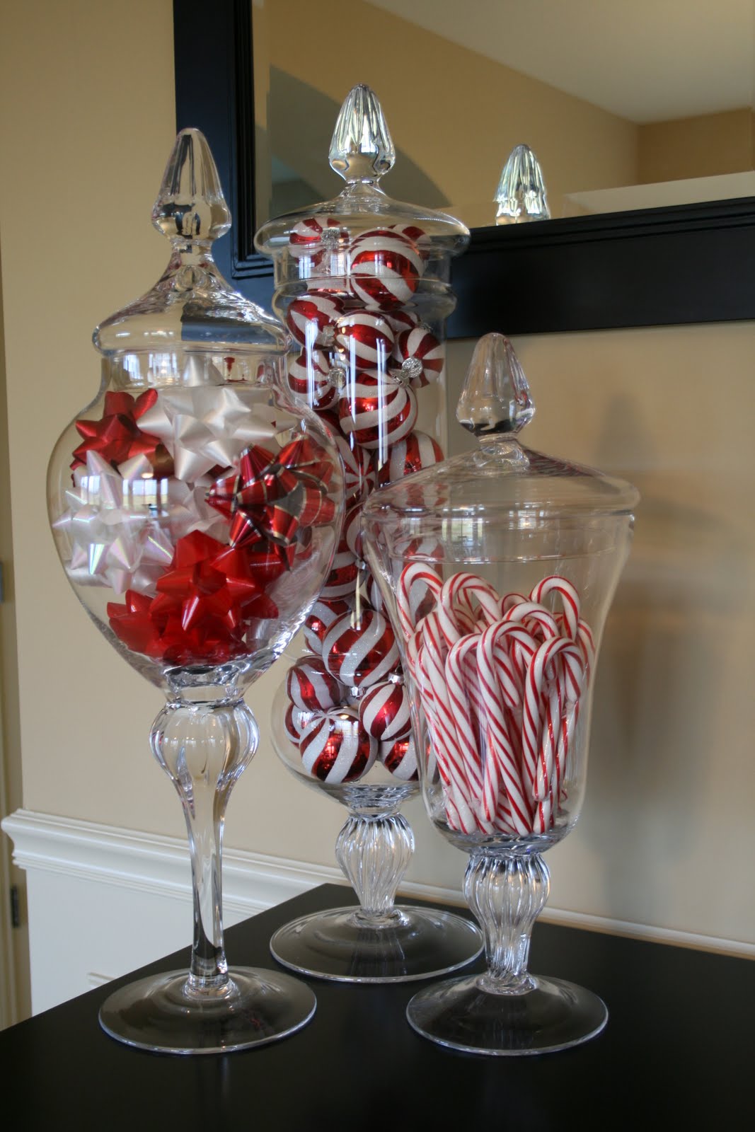 Candycanes, Holiday Bows, and Ornament filled Apothecary Jars