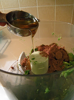 Drizzling agave into Food Processor with Avocado and Cocoa