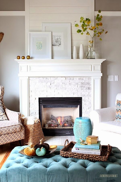 white mantle subway tile fireplace surround in living room