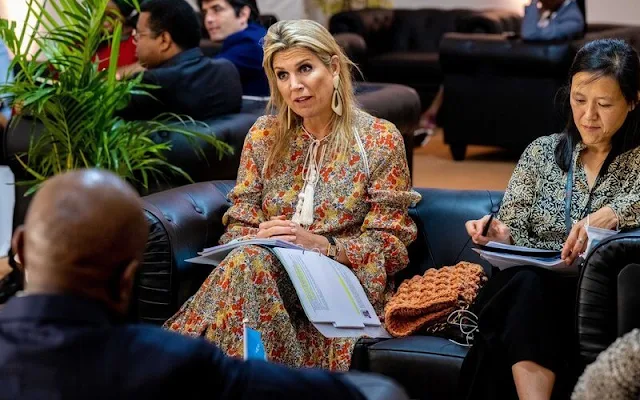 Queen Maxima wore a samera multi-coloured floral top and samera pleated skirt by Alexis