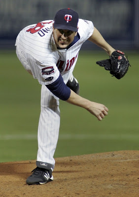 Minnesota Twin pitcher Carl Pavano delivering a pitch