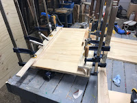 Long edges clamped and glued in place