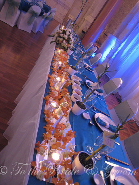 Front of the bridal table I decorated with swirled mirrors tea lights 