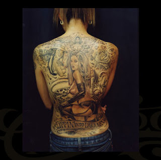 Hip hop lower back tattoos