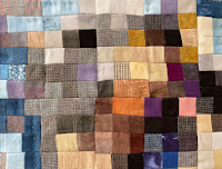 pixelated otter head from art quilt