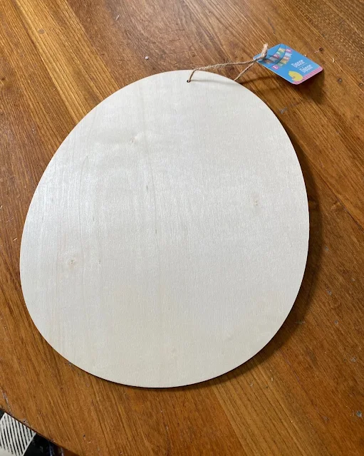 Photo of unpainted wooden Easter egg cutout