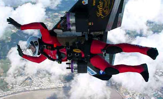 Jetman Yves Ross over swiss alps