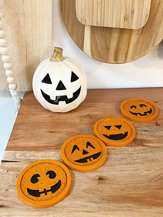 jack o lantern coasters and a jack o lantern