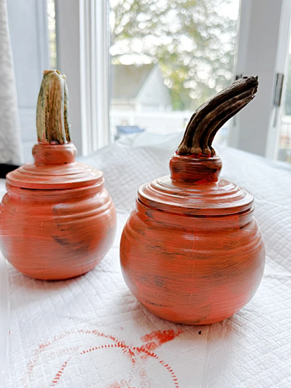 orange pumpkin jars with stems