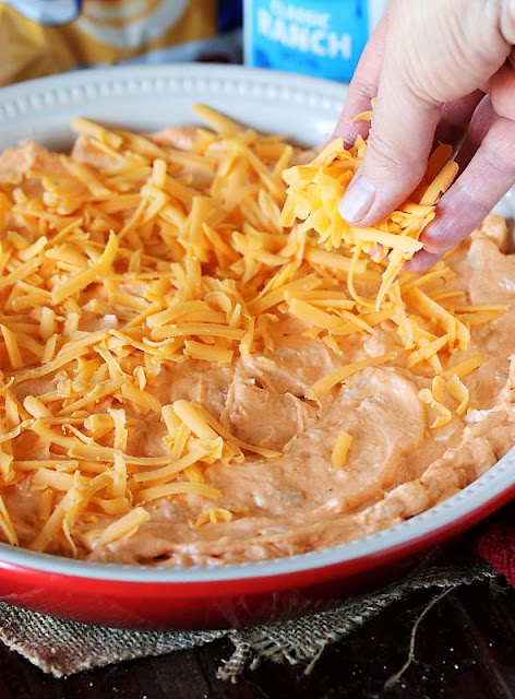 Topping Buffalo Chicken Dip with Shredded Cheese Image