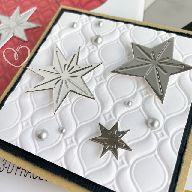 Square Christmas or New Year's card created with Sizzix Sufacez cardstock in black, gold, silver and white; Ornate Repeat embossing folder, festive foliage die; and Pinkfresh Studio Matte Silver Pearls.