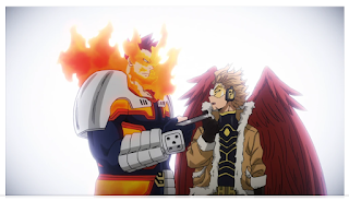 Hawks, a young man with huge feathered wings, handing a book to Endeavor, a giant man with a burning mask and flames exploding from his shoulders.
