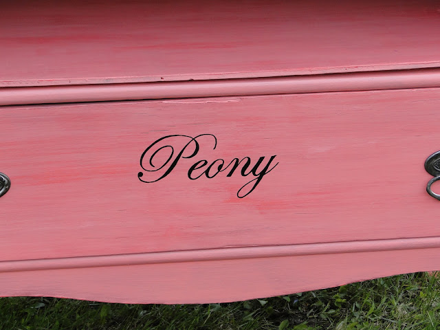 hand painted word Peony on wooden dresser