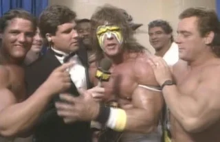 WWE/WWF SUMMERSLAM 1988: The Ultimate Warrior celebrates his victory in an interview with Sean Mooney