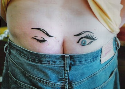 Mischievous Winking Eye Tattoo on Buttock