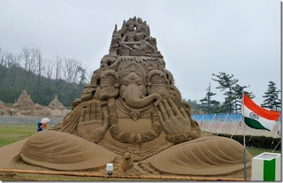 Most popular Amazing HEAD Sand Sculputres wallpapers 2012