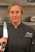 . female executive chef, who wields a sharp knife and is one hot babe.