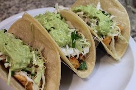 Ancho Chile Chicken Tacos with Slaw and Avocado Cream 