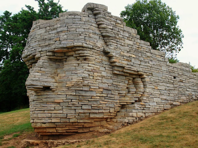 Giant Chief's Head Busts Out of Wall