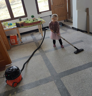 Rosie doing the hoovering, very well indeed