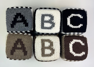 hand knit abc 123 foam blocks in the neutrals black, gray, brown and white