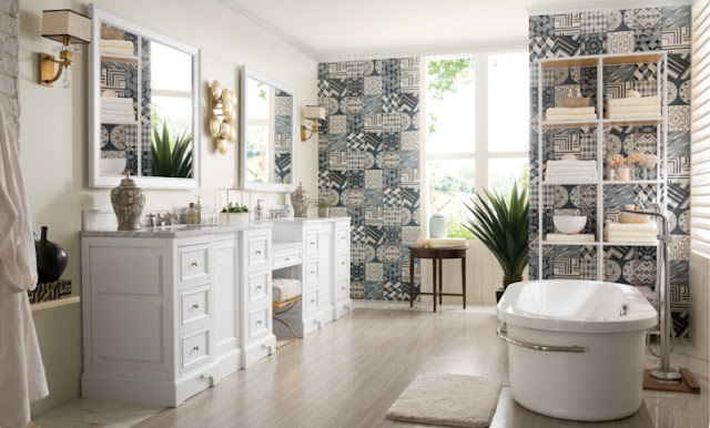 Large bright bathroom with lots of color on the statement wall.