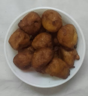 Sweet Palm fritter, Coconut laddu & Malpua