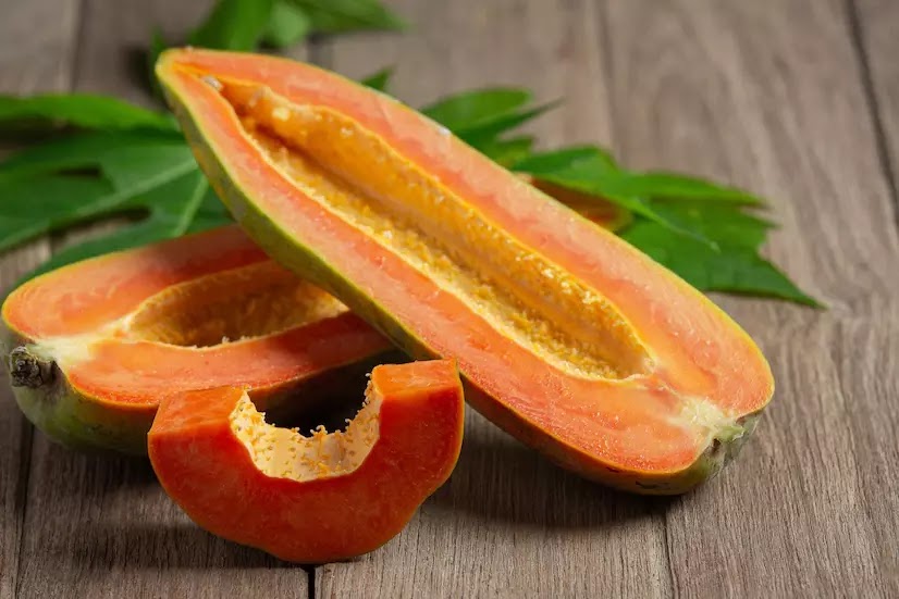 <a href="https://www.freepik.com/free-photo/fresh-papaya-cut-into-pieces-put-wooden-floor_10991589.htm#query=papaya&position=15&from_view=search&track=sph">Image by jcomp</a> on Freepik