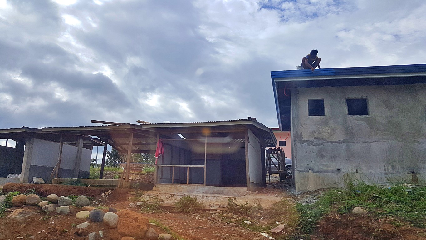 some shelters also located in the temporary shelter areas are being built with concrete (maybe by the landowners themselves)