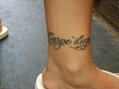 Tattoo of Latin words written on foot Latin Foot Tattoo Submitted by sid