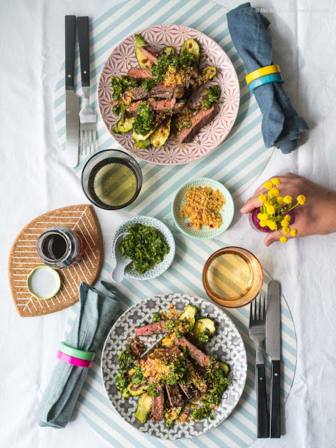 Grilled steak and zucchini with green salsa and spicy crunchy crumbs. A light and wonderfully spicy summer meal with maple syrup.