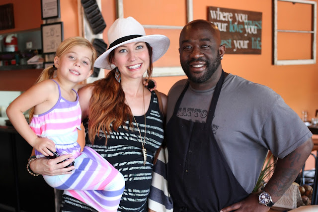 Travel Blogger Amy West and daughter with Chef Kenny Gilbert at Gilbert's Underground Kitchen