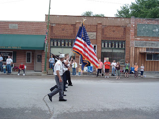 Veterans with Flag leading the parade