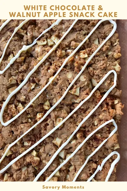 Finished white chocolate and walnut apple snack cake with white chocolate drizzle.