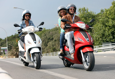 New 2016 Piaggio Fly 125cc Scooter long drive couple image