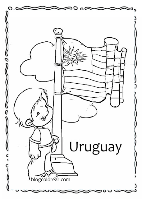 niño izando la bandera de Uruguay ondeante
