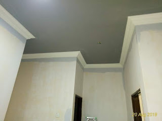 Pemasangan plaster siling dan aksesori cornice