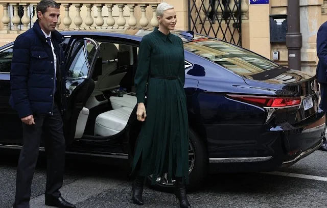 Princess Charlene wore a new dark green wool mousseline maxi dress by Akris. Camille Gottlieb wore a gray wool blazer, jacket