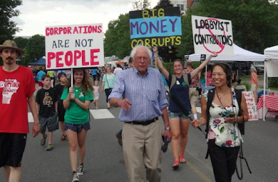 Bernie Sanders marching