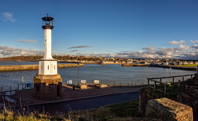 Photo of Maryport Lighthouse with the town in the background