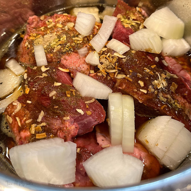 Roast beef seasonings and onions in instant pot