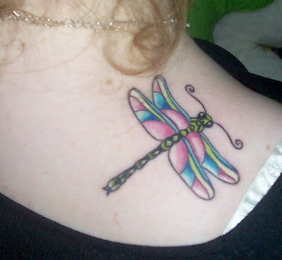dragonflies tattoo. large dragonfly tattoo on the