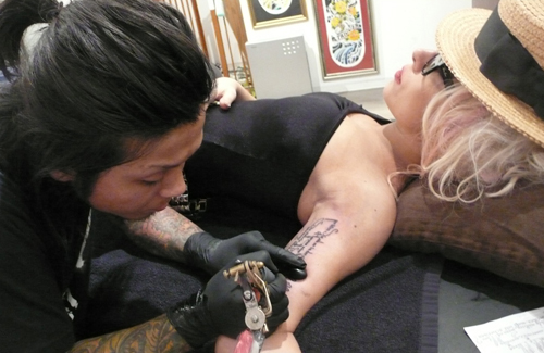 lady gaga tattoo on her back. Lady Gaga Back Tattoo: Lady