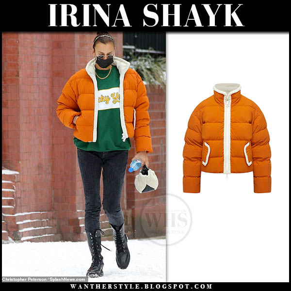 Irina Shayk in orange puffer jacket and skinny jeans