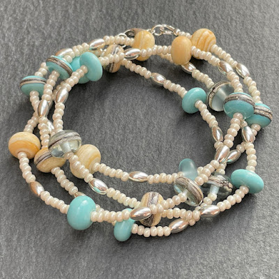 Handmade lamwork glass bead necklace by Laura Sparling