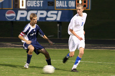 Cliff Smith drives for one of his two goals on the night