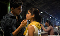 Dev Patel and Freida Pinto in SLUMDOG MILLIONAIRE