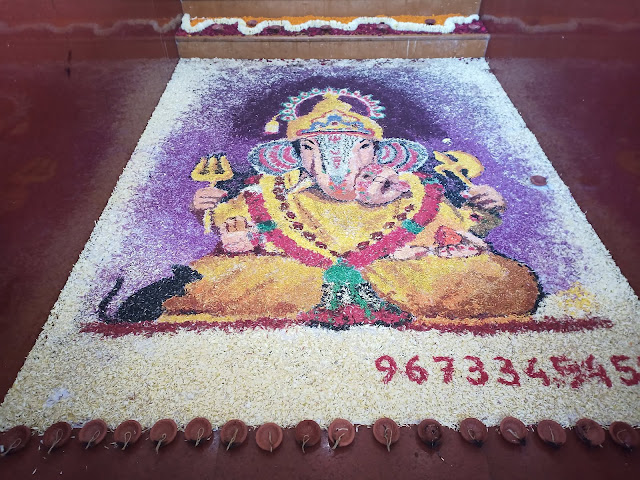 Ganesh made from coloured powder at Shreemant Dagdusheth Halwai Ganpati Mandir